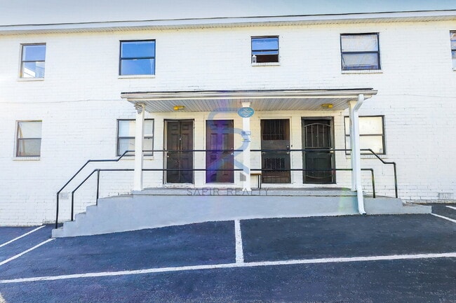 Building Photo - Move in before December 31st and choose your reward: a $250 Amazon Gift Card or a 55" Smart TV!