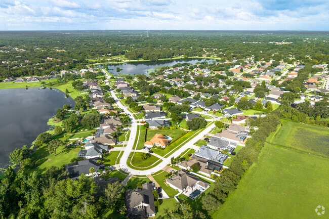 This unique community is nestled between two lakes, Lake Michaela and Lake Stearns.