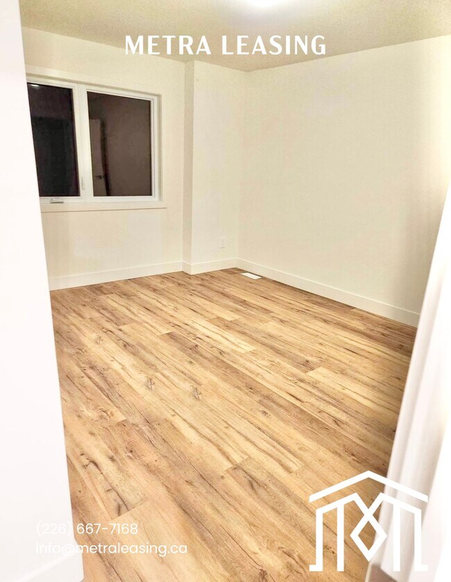 Photo du bâtiment - Three Bedroom Townhouse