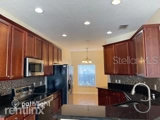 Building Photo - 4 br, 2.5 bath House - 575 Hibiscus Cove D...