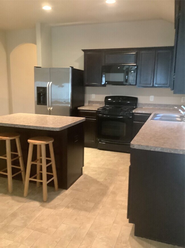 Foto del edificio - 5506 Rustling Gates Ln