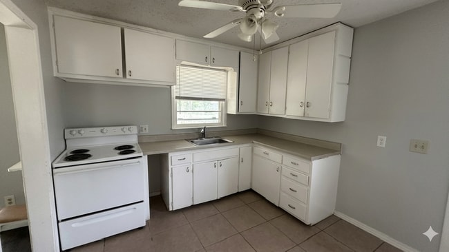 Photo - Welcoming 2-Bedroom Home with Expansive Backyard