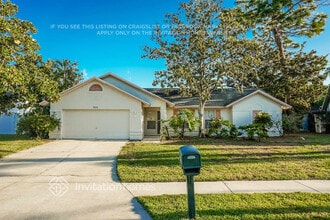 Building Photo - 7115 Queen Palm Cir