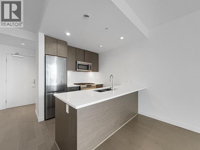 Building Photo - 9060 University Crescent