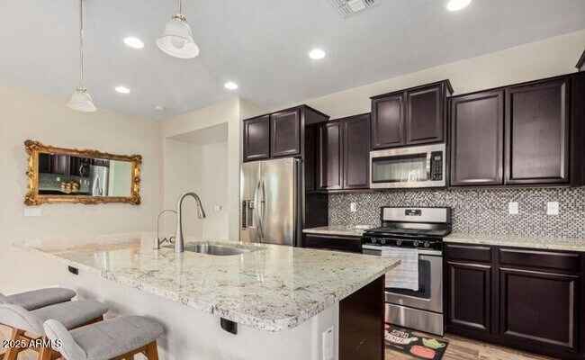 Building Photo - 41007 W Portis Dr