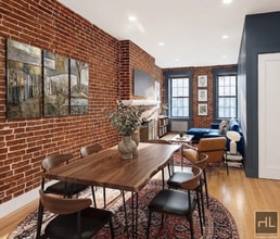 Building Photo - Spacious 1 Bed Flex 2 with In-Unit W/D in Prime Midtown East