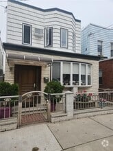 Building Photo - 54-31-54-71 71st St