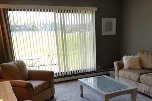 Sala de estar - The Concord Apartments