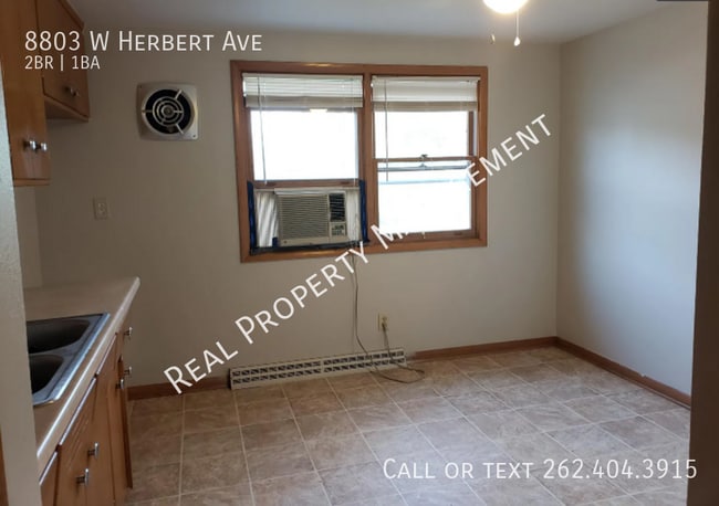 Building Photo - 8803 W Herbert Ave
