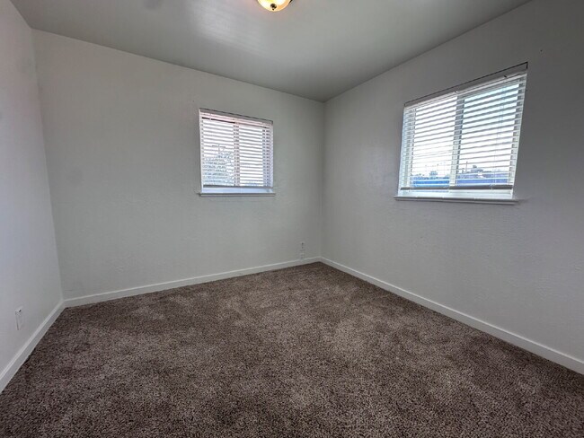Foto del edificio - Newly Remodeled Two-Bedroom Condo! Rent Includes Water, Sewer, Trash, and Internet!