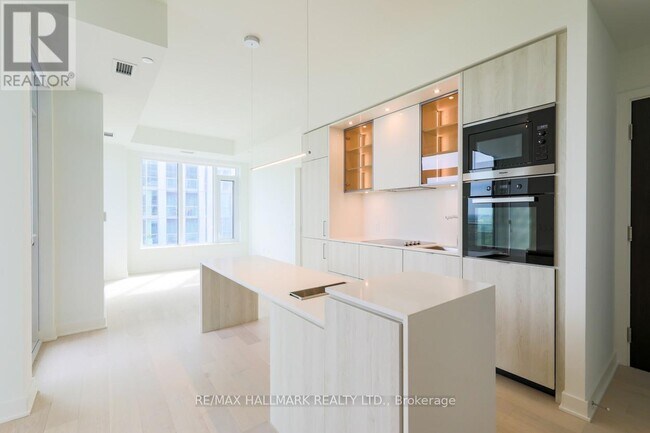 Photo du bâtiment - 11-4711 Yorkville Ave