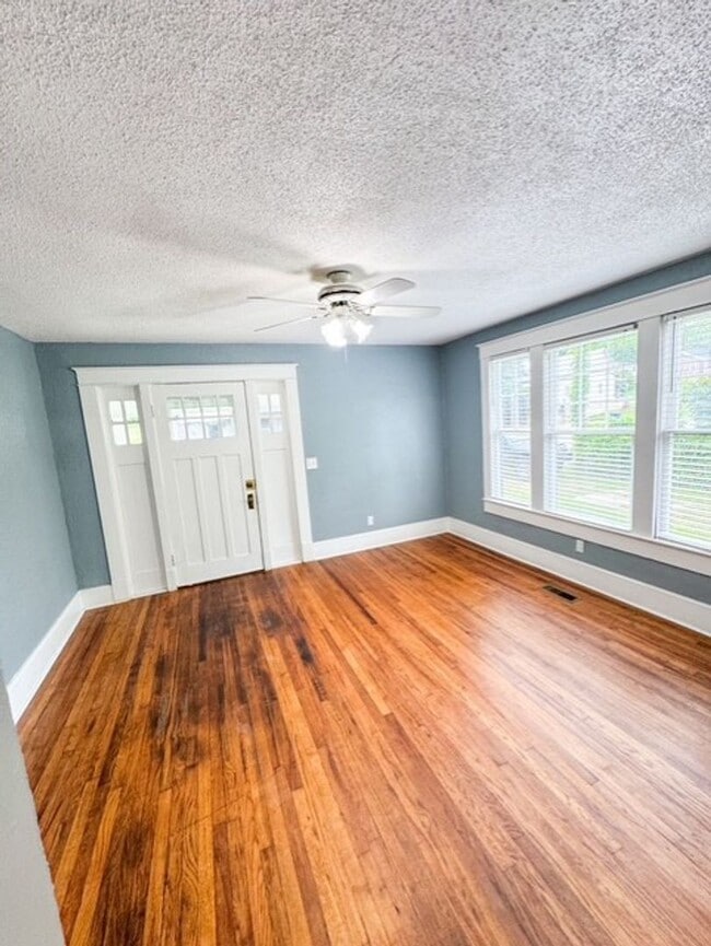 Building Photo - Spacious 4-Bedroom Home with Modern Upgrad...