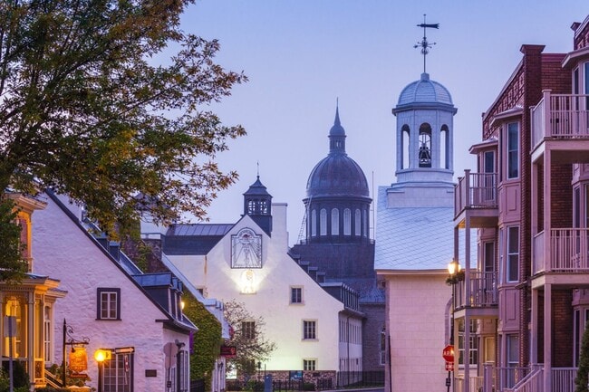 Historic architecture in Old Trois-Rivières at twilight.