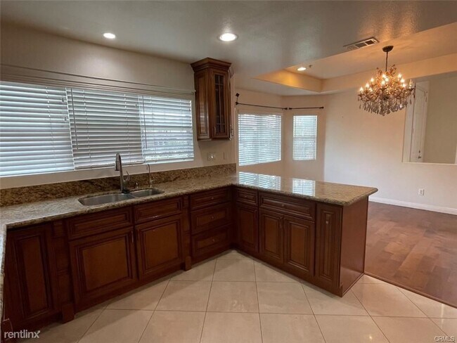 Foto del edificio - 4 br, 3 bath House - 4937 Peck Rd Unit C