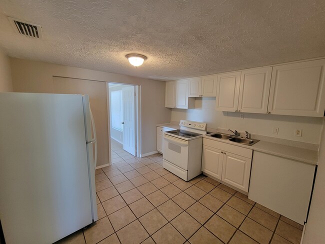 Building Photo - 7408 Sea Grape Ave