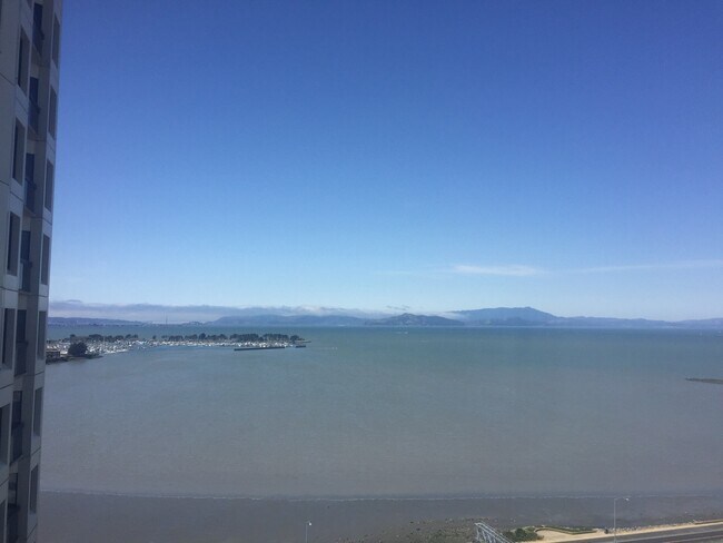 Building Photo - Enjoy sweeping views of the bay and Golden...