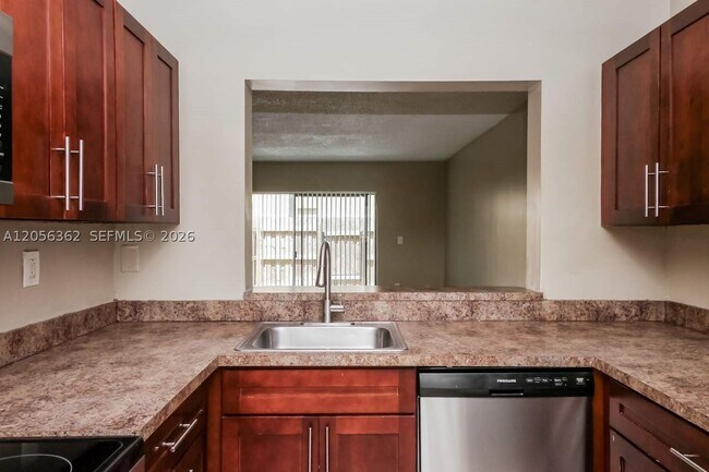 Building Photo - 9489 Palm Cir N