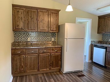 Building Photo - 5579 N Avocado Ln