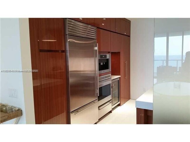 Building Photo - 9701 Collins Ave
