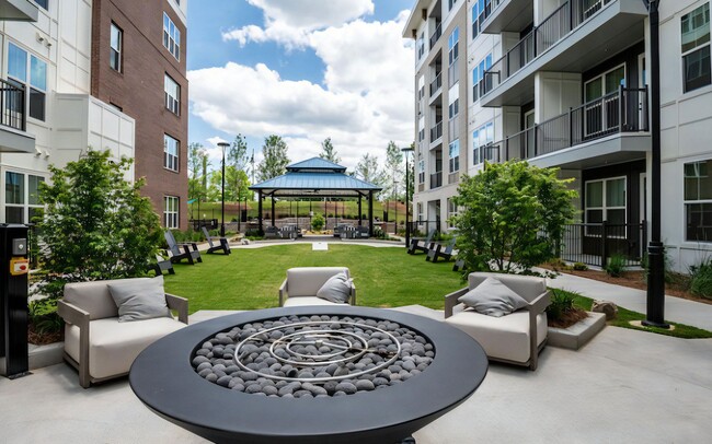 Courtyard with Firepit - The Elden Galleria