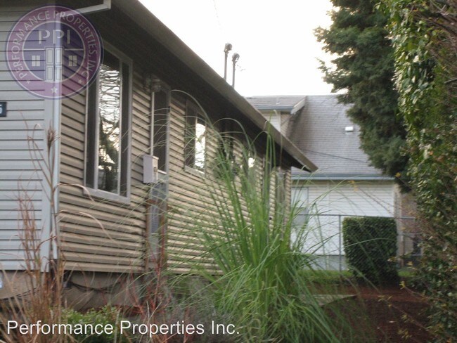 Building Photo - 5263-5265-5265 NE 24th Ave