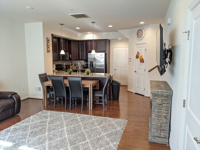 Building Photo - Bottom level (two story) *END UNIT* condo ...