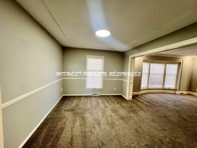 Foto del edificio - Spacious 4-Bedroom, 3-Bathroom Home with Fenced Yard and Bonus Spaces!