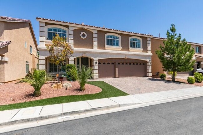 Foto del edificio - Bright & Spacious 5-Bedroom Home with 3-Car Garage in 89141