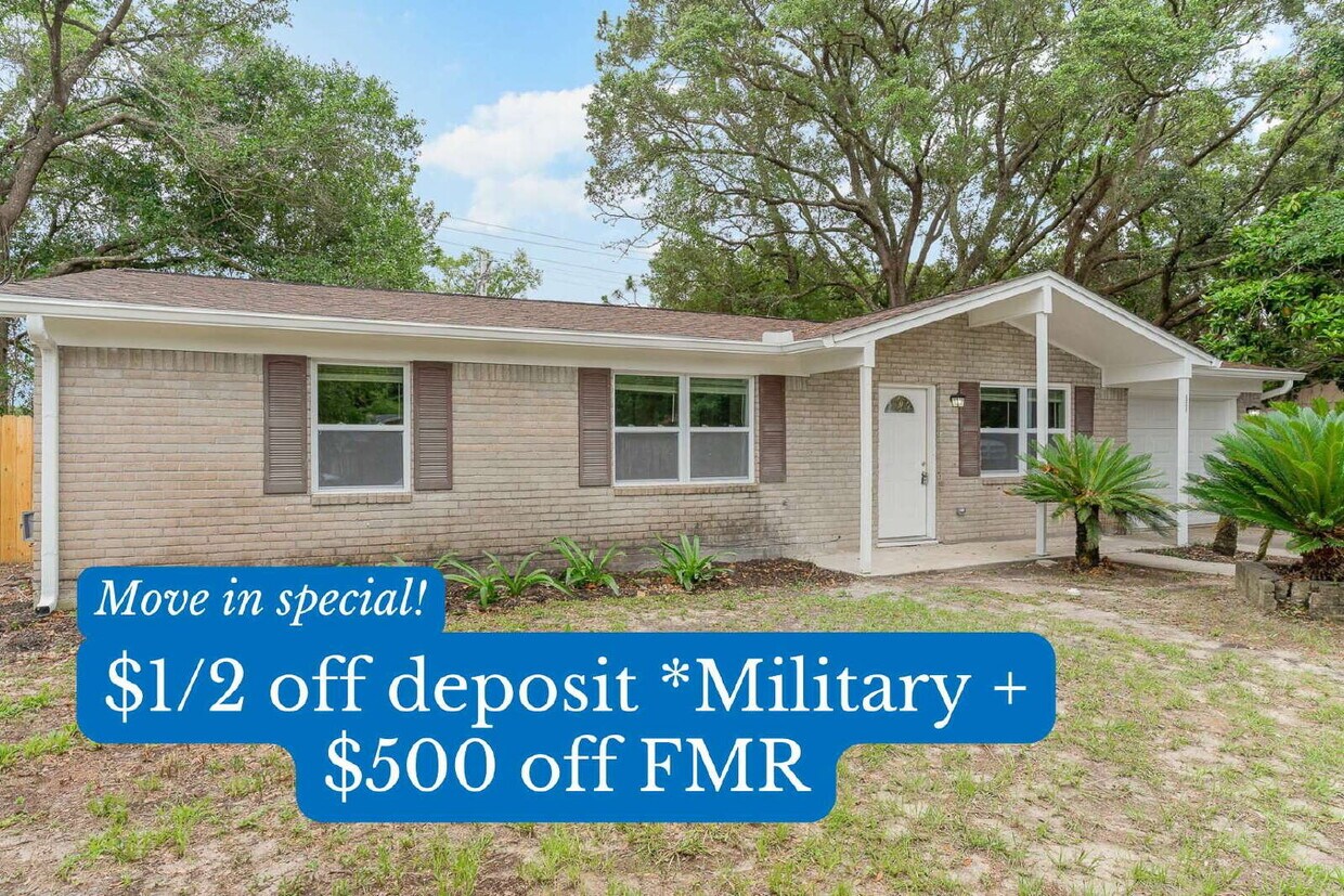 Primary Photo - "Spacious 4-Bedroom, 2-Bath Home with Fenc...