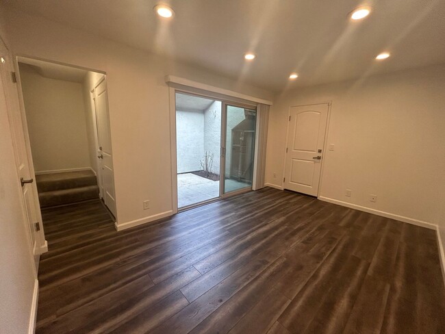 Building Photo - Move-In-Ready two-story townhome located o...