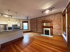 Building Photo - 1210 E Colfax Ave