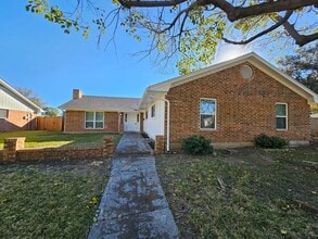 Building Photo - 2400 Meadow Creek Dr