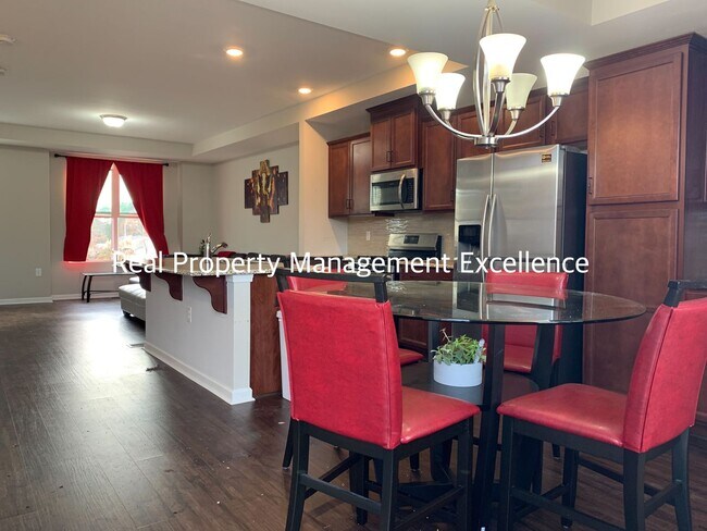 Building Photo - Amazingly Located Townhome, Featuring 3 Be...
