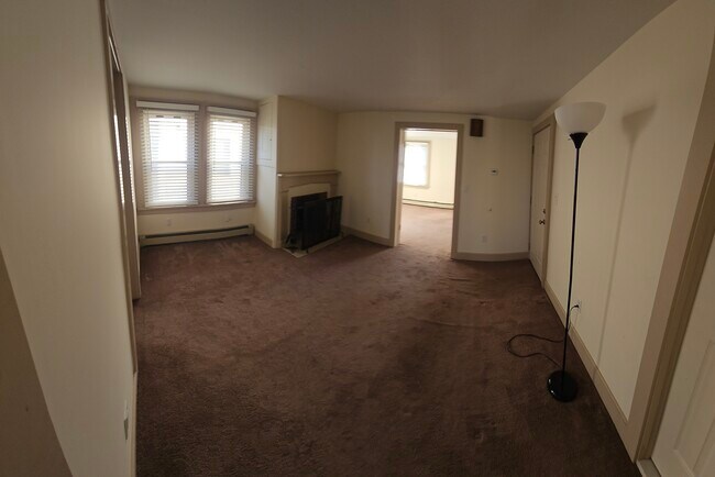 Living room with fireplace - 101 Washington St