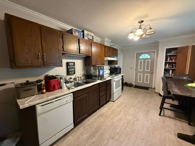Building Photo - Beautiful 3-Bedroom Home with Hardwood Floors, Fenced Yard & Detached Garage