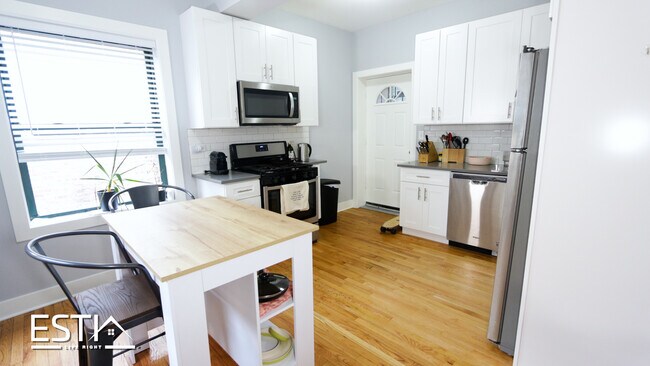 Foto del edificio - 937 E 54th Pl