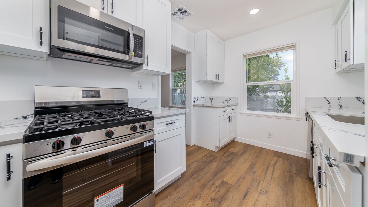 Primary Photo - Move-in ready! Be the first to enjoy this beautifully renovated 2 bedroom, 1.5 bath duplex unit at