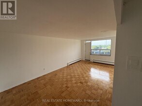 Building Photo - 1765 Lawrence Ave E