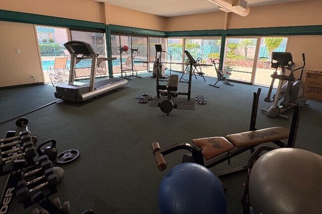 Gimnasio - Sandpointe Apartment Homes