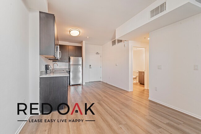 Building Photo - ~2 Months FREE~ Gorgeous Studio with a Spa...