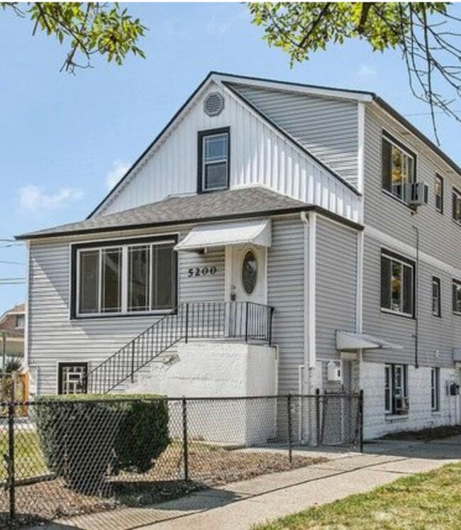 Building Photo - 5200 S Lorel Ave