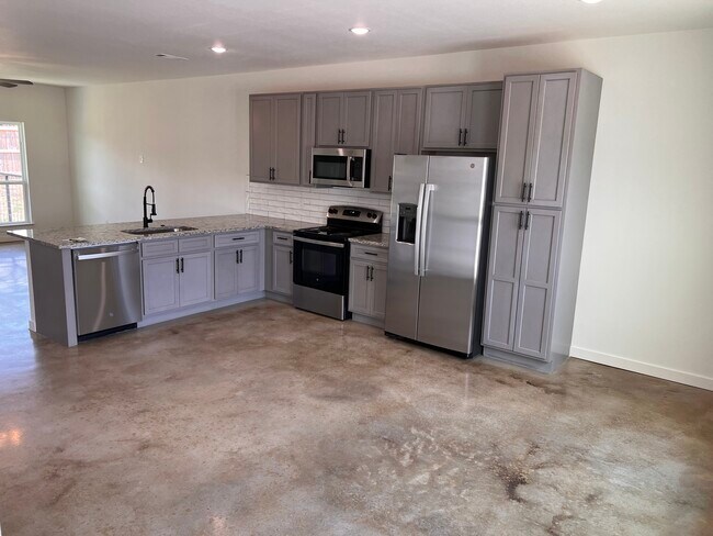 Foto del edificio - 2208 J E Woody Rd