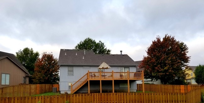 Back view of the house w/yard. - 21506 W 53rd Terrace