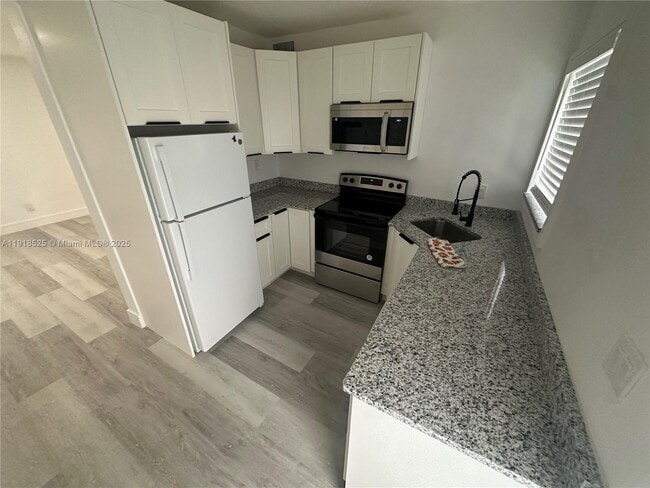 Foto del edificio - 1308 NW 13th Ct