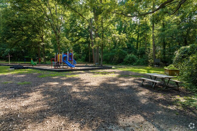 Tuckahoe Public Park has a shaded playground and trails along the creek.