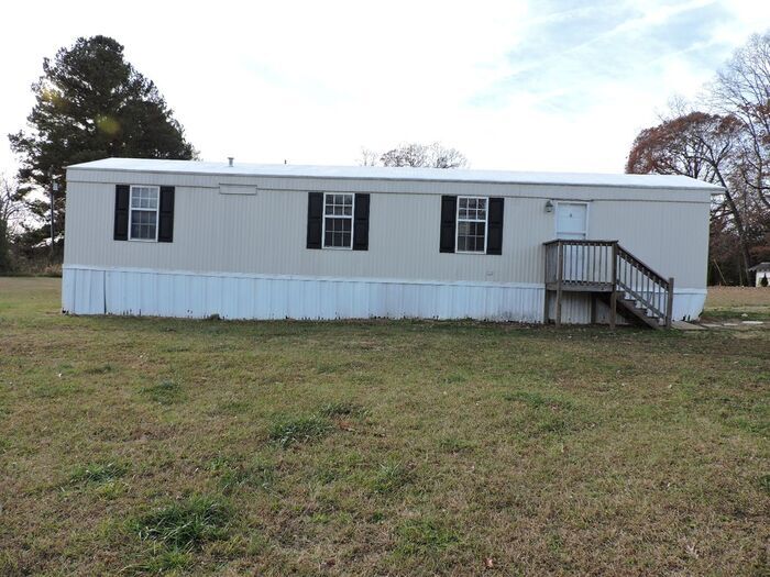 Primary Photo - Tidy Mobile Home on Spacious Lot