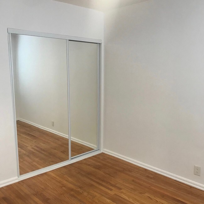 BEDROOM MIRRORED CLOSET - 2026 Montana Ave