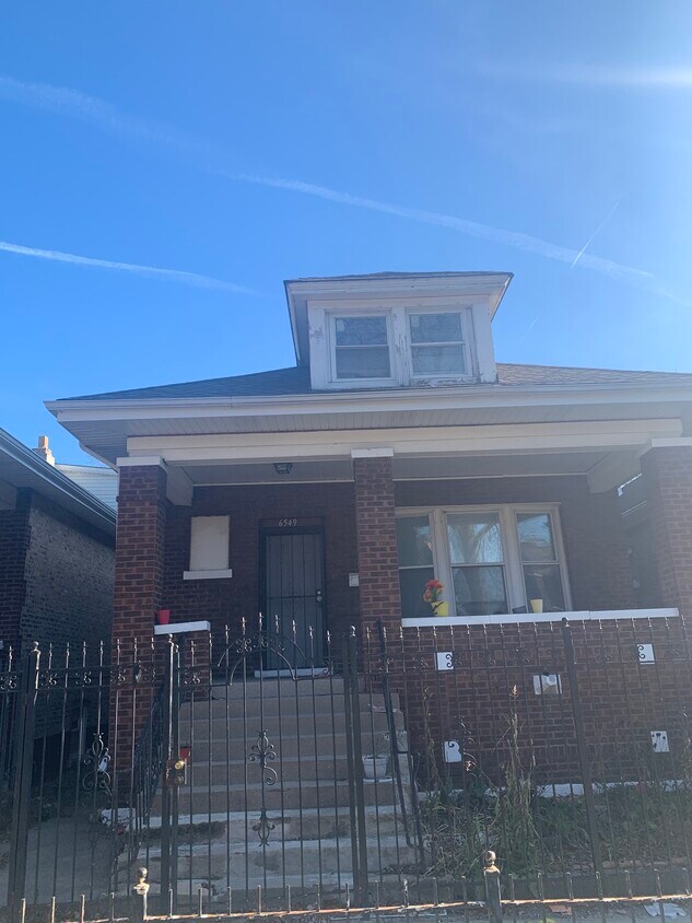 Front of home - 6549 S Campbell Ave