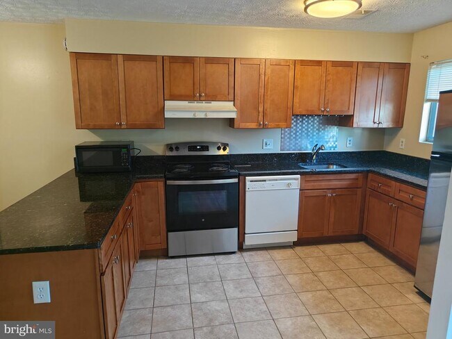 Foto del edificio - 15245 Coachman Terrace