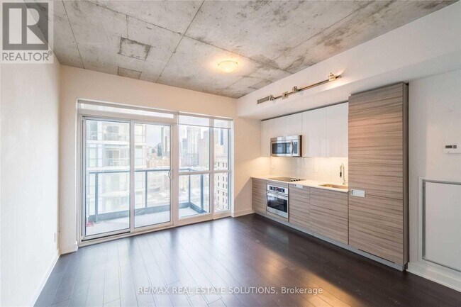 Photo du bâtiment - 210-1210 Simcoe St
